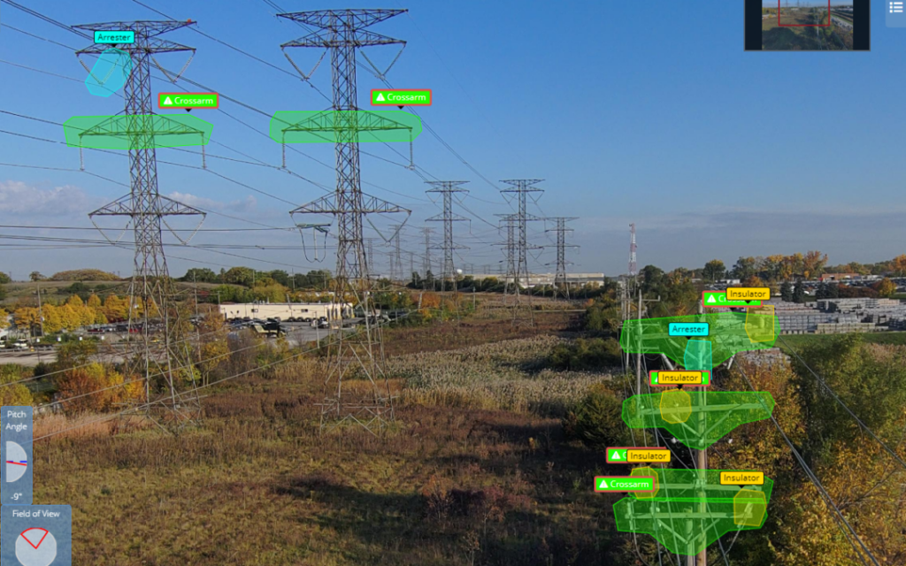 A landscape with several high-voltage power lines and towers labelled "Arrester," "Crossover," and "Insulator" in green and yellow, showcasing a utility inspection system interface enhanced by advanced Drone Asset Management.